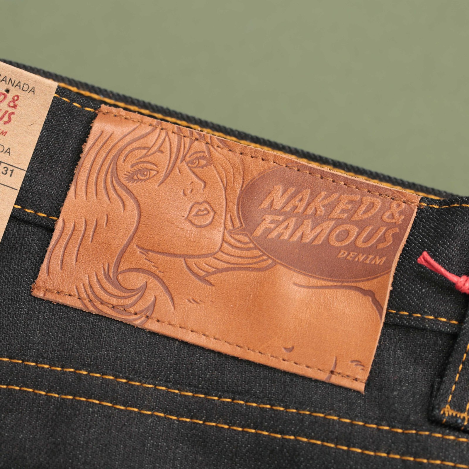 NAKED & FAMOUS SuperGuy Deep Indigo Stretch Selvedge jeans with leather patch