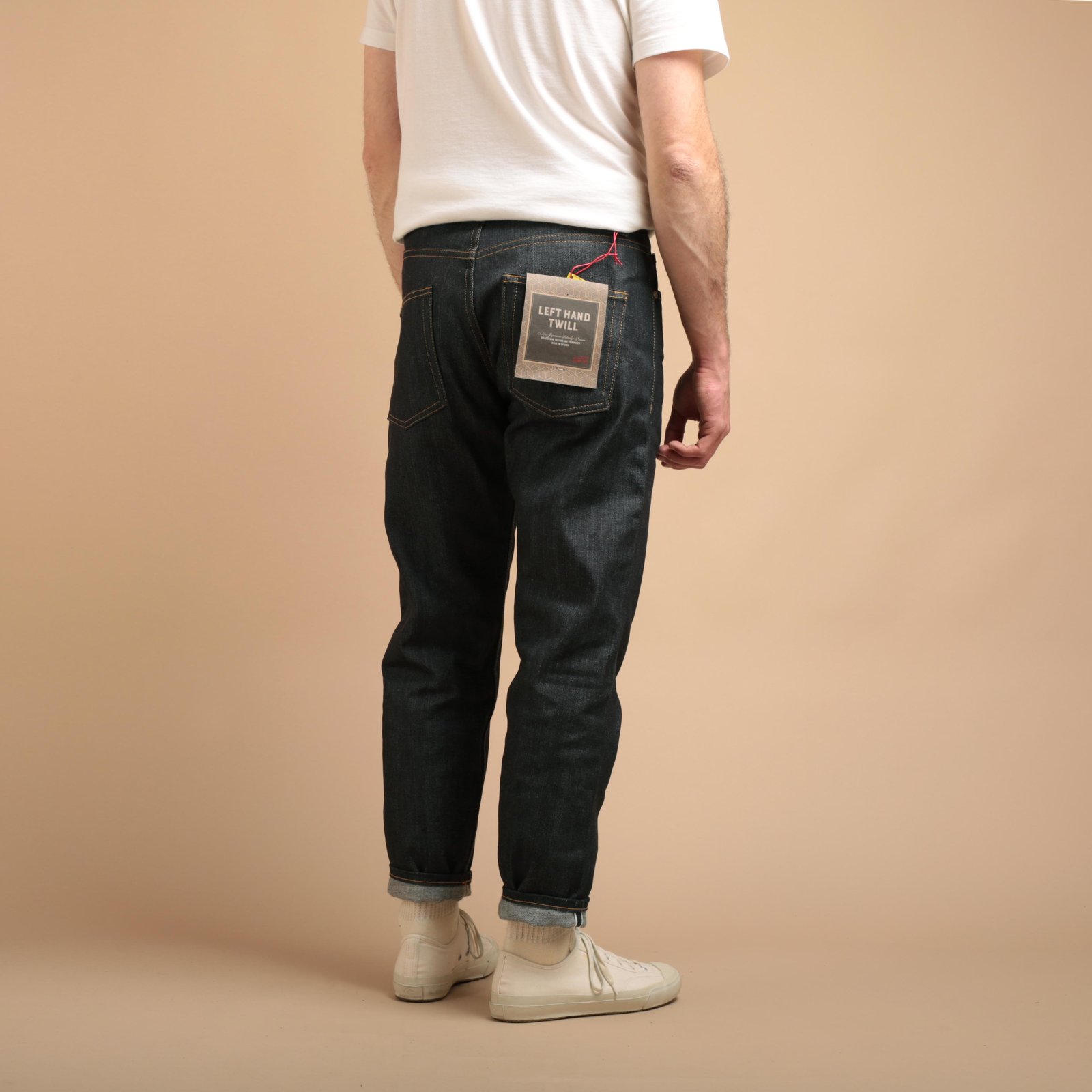 NAKED & FAMOUS EasyGuy Left Hand Twill Selvedge worn from the back