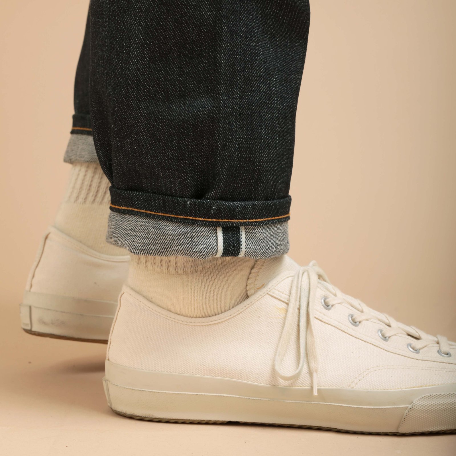 NAKED & FAMOUS EasyGuy Left Hand Twill Selvedge worn leg opening