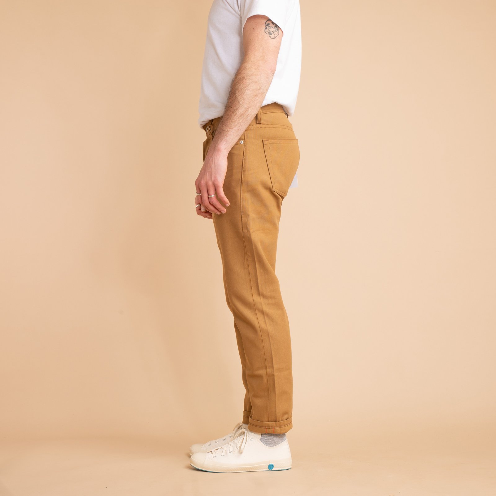 NAKED & FAMOUS WeirdGuy Army Green "Duck" Canvas Selvedge worn on the side