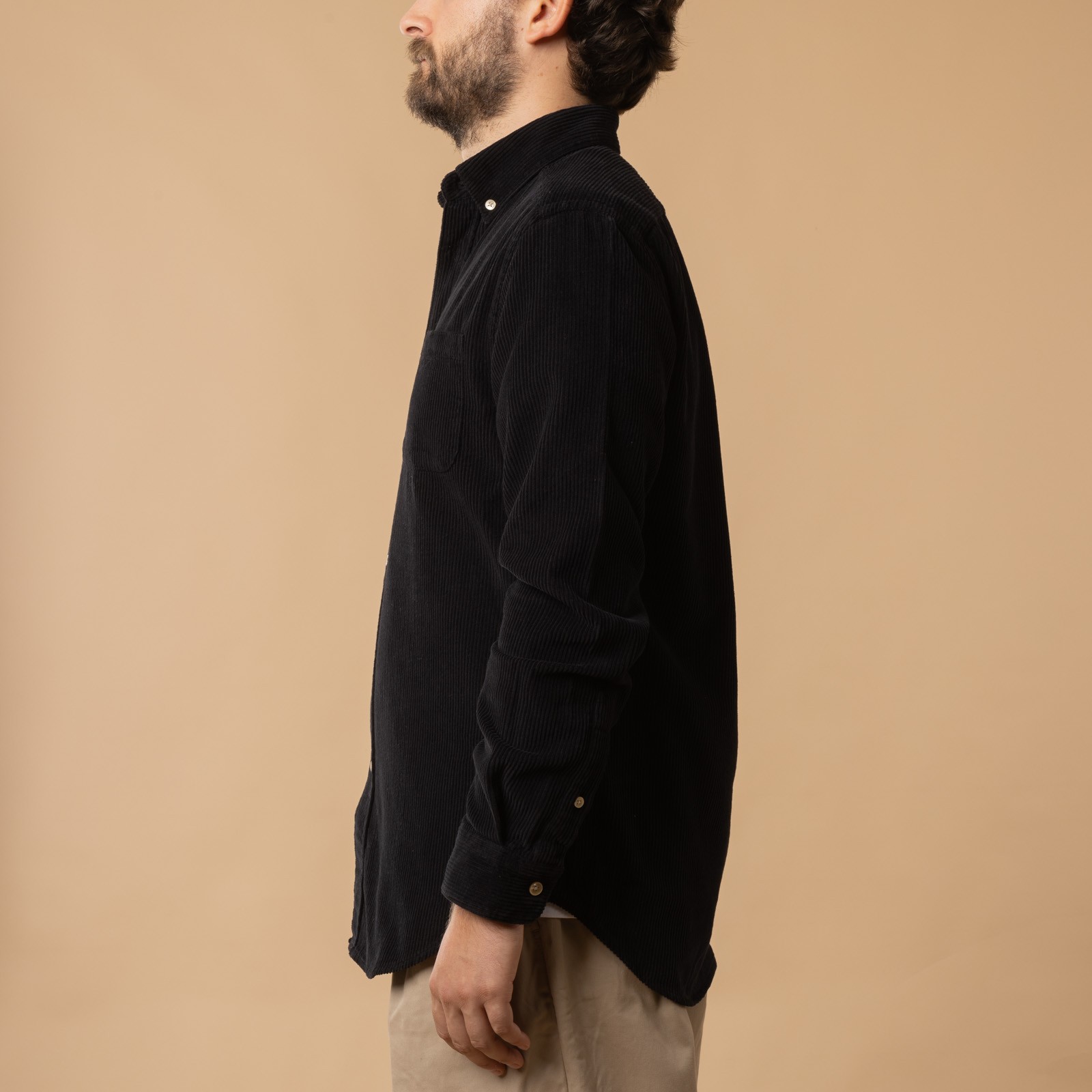Portuguese Flannel Lobo cotton shirt in Black, side profile.