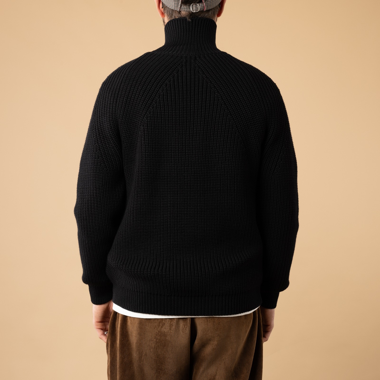 BATONER Signature Turtle Neck Black Sweater - View from the Back