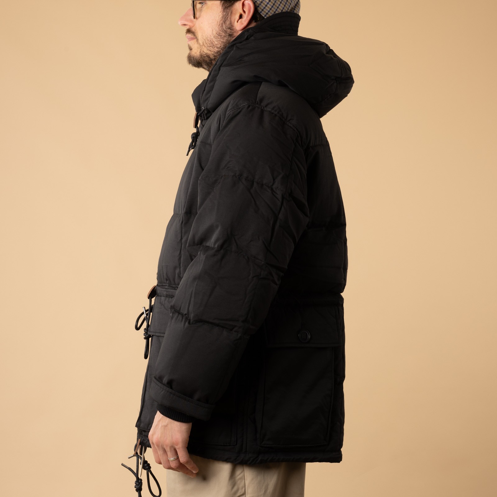 FRIZMWORKS Karakoram Down Parka Black worn from the side