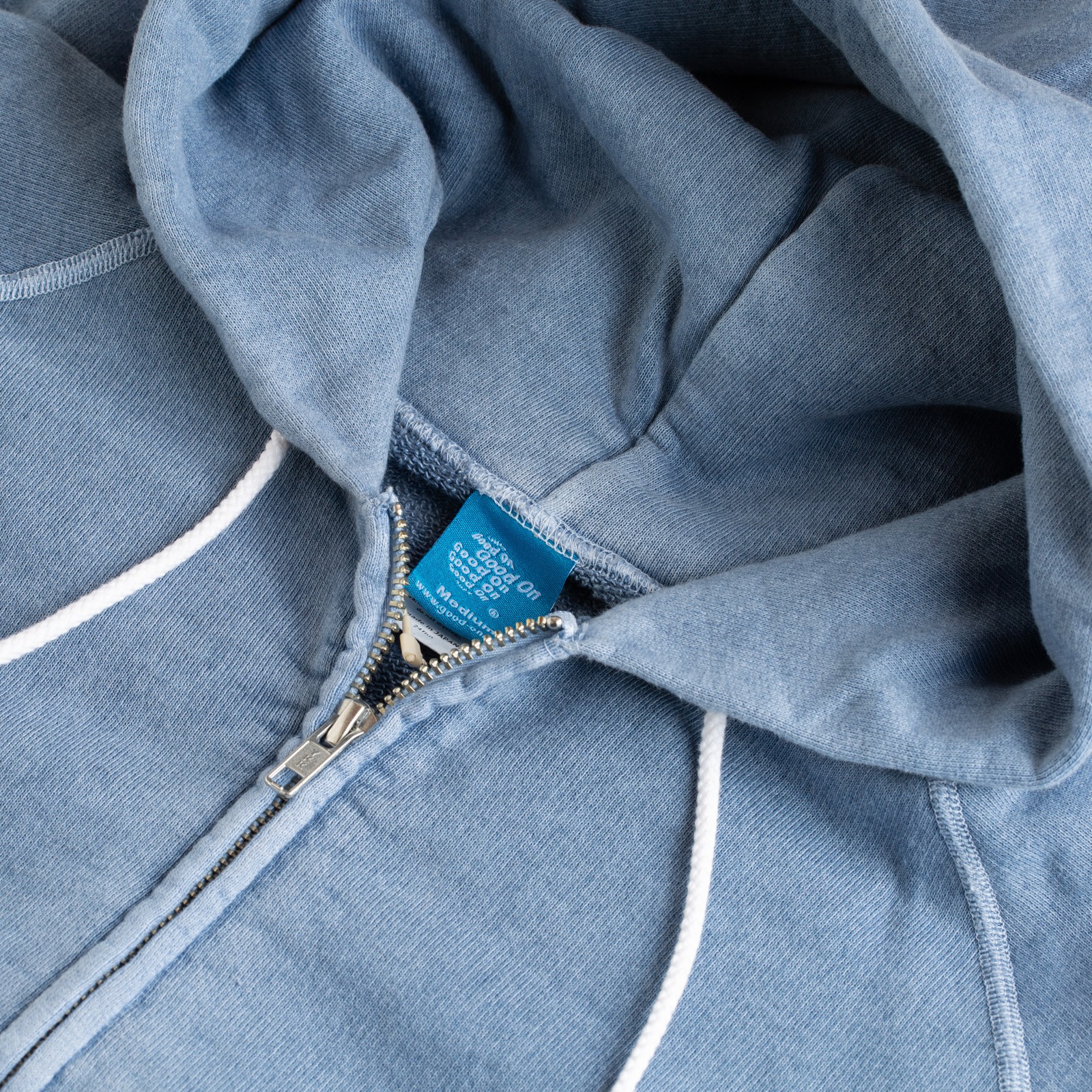 Detail of the GOOD-ON Raglan Zip Hood Sweatshirt in Ajisai Color