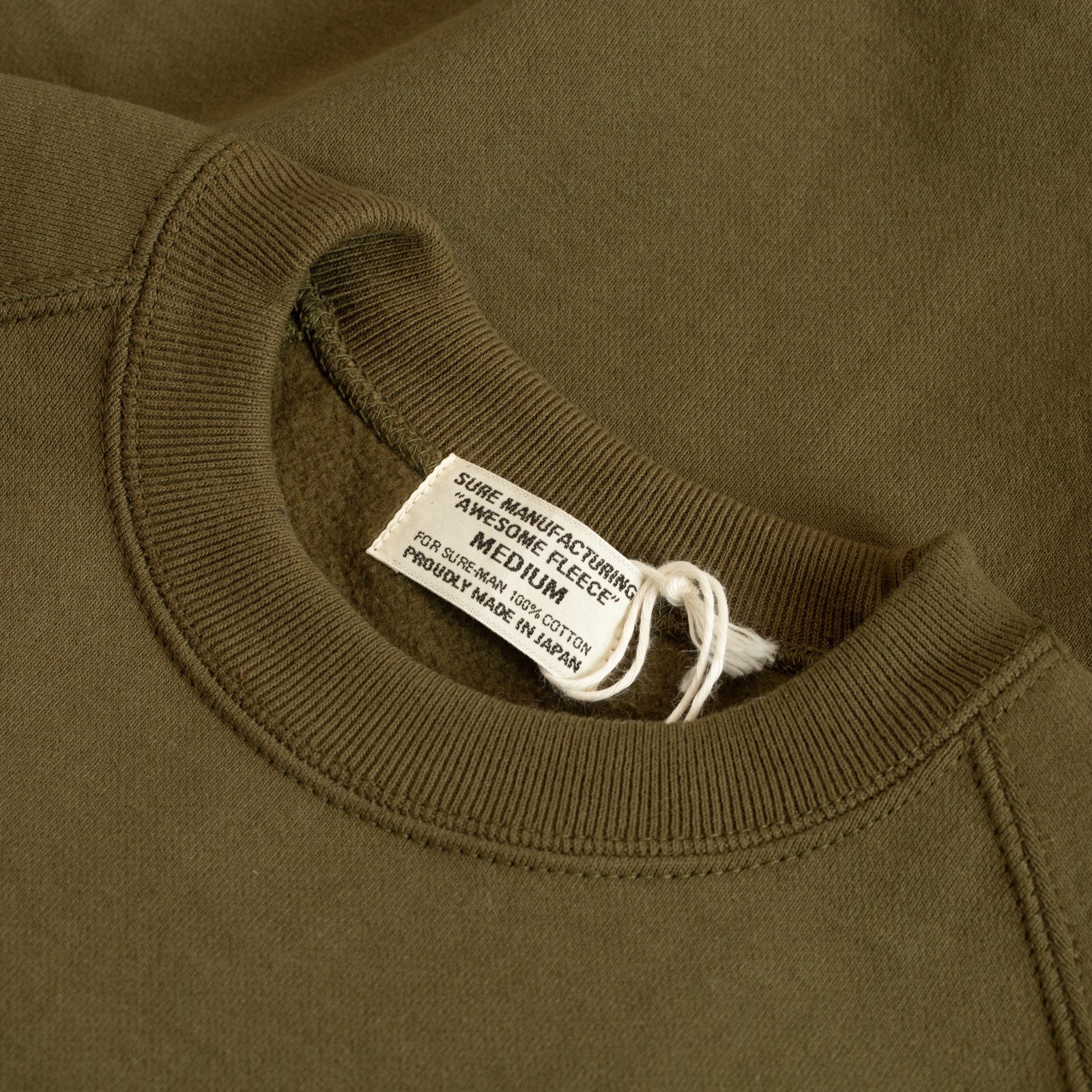 image flâneurs col XX DEVELOPMENT  SURE MFG Awesome Crewneck Sweatshirt Highland green porté de face (2)
