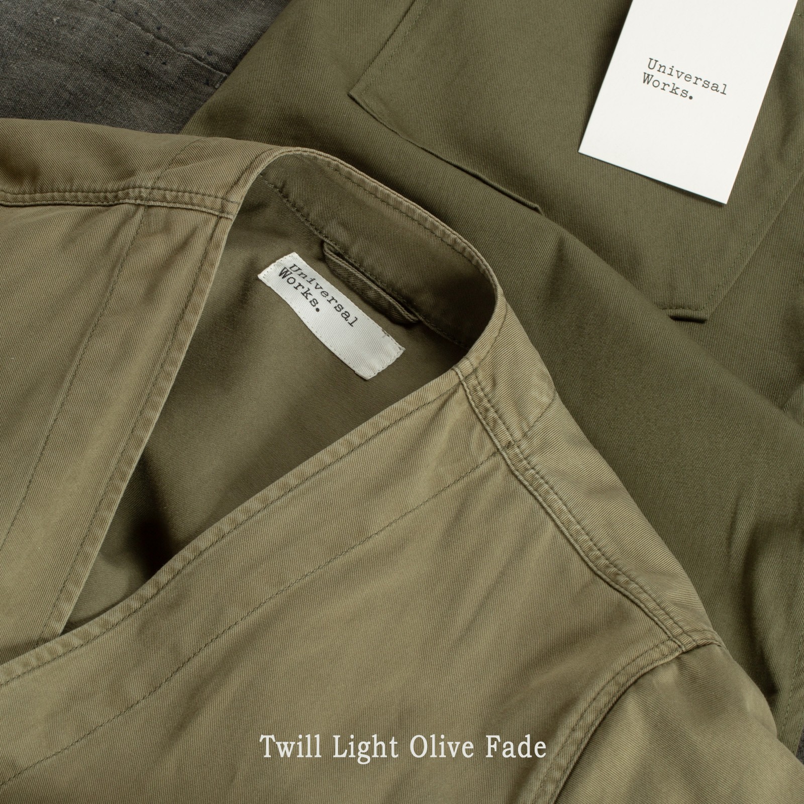 image flâneurs Universal Works Hi Water Trouser Twill Light Olive fabric fade