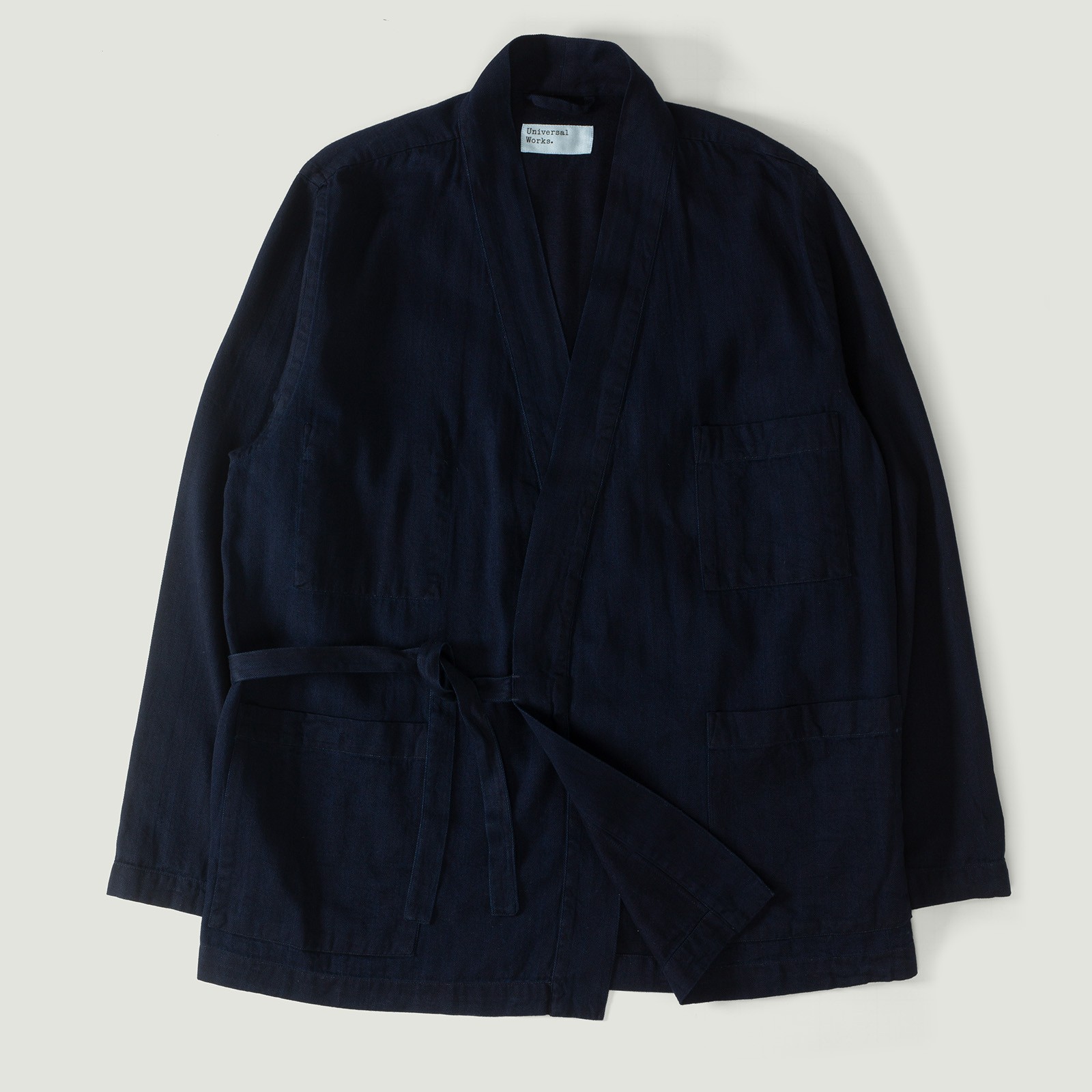 UNIVERSAL WORKS Kyoto Work Jacket in Indigo Herringbone worn from the front
