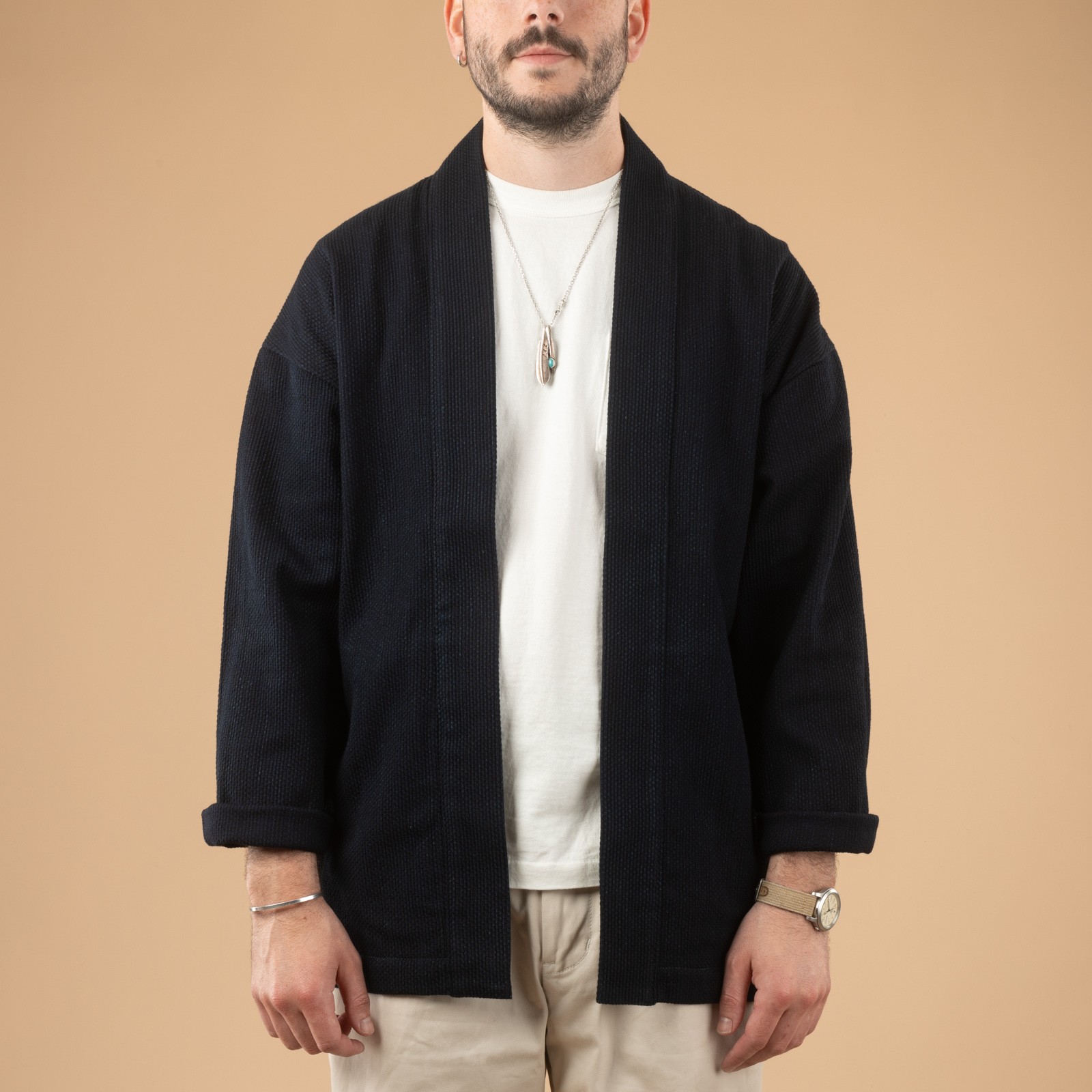 image of flâneurs wearing a front-facing JAPAN BLUE JEANS Indigo Sashiko Haori jacket