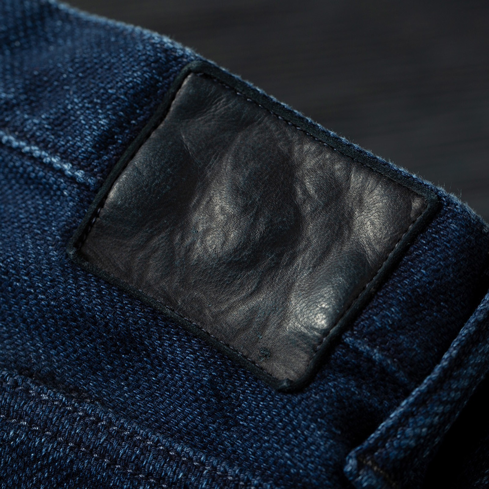 oni x flaneurs detail leather patch indigo bio wash