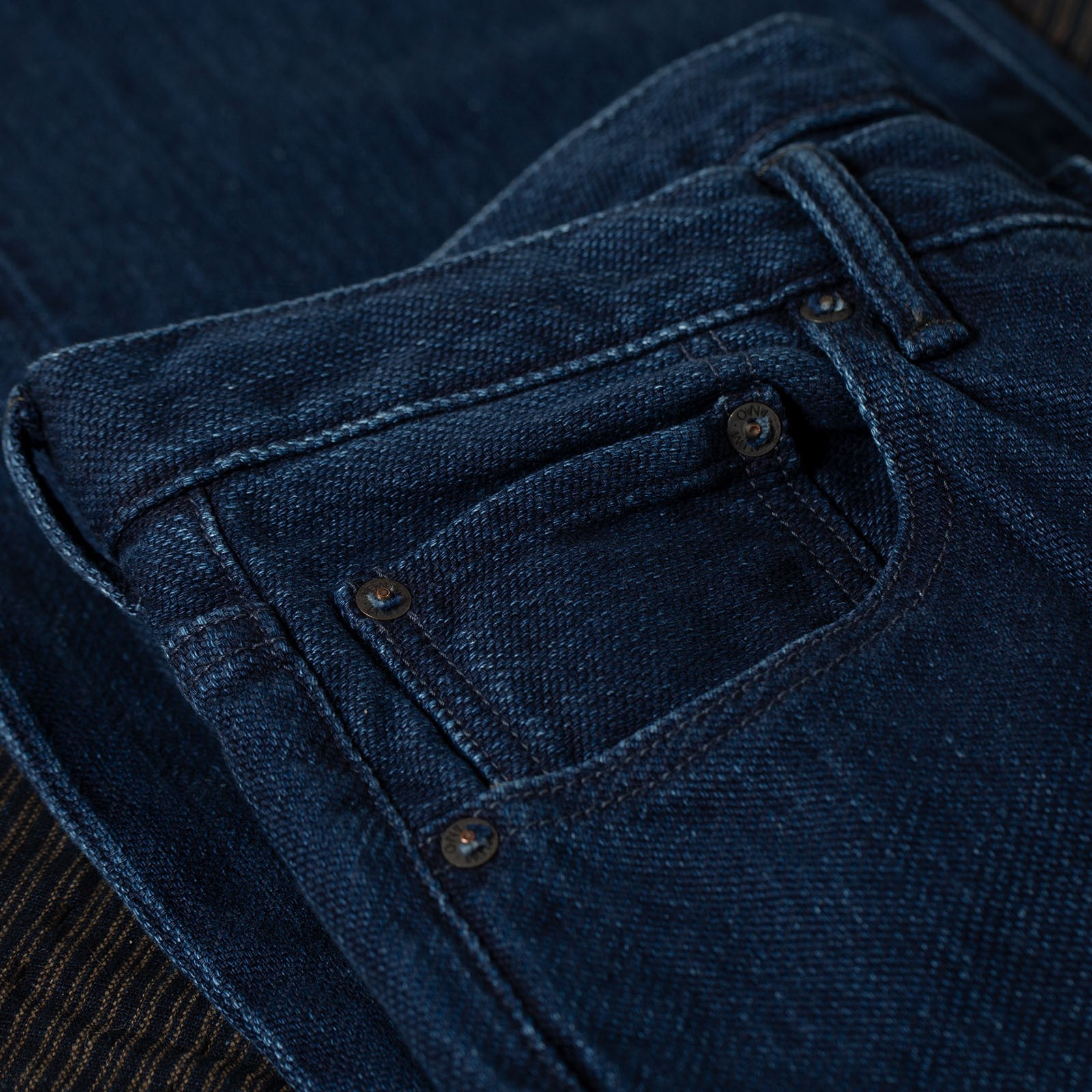 oni x flaneurs detail indigo biowash coin pocket