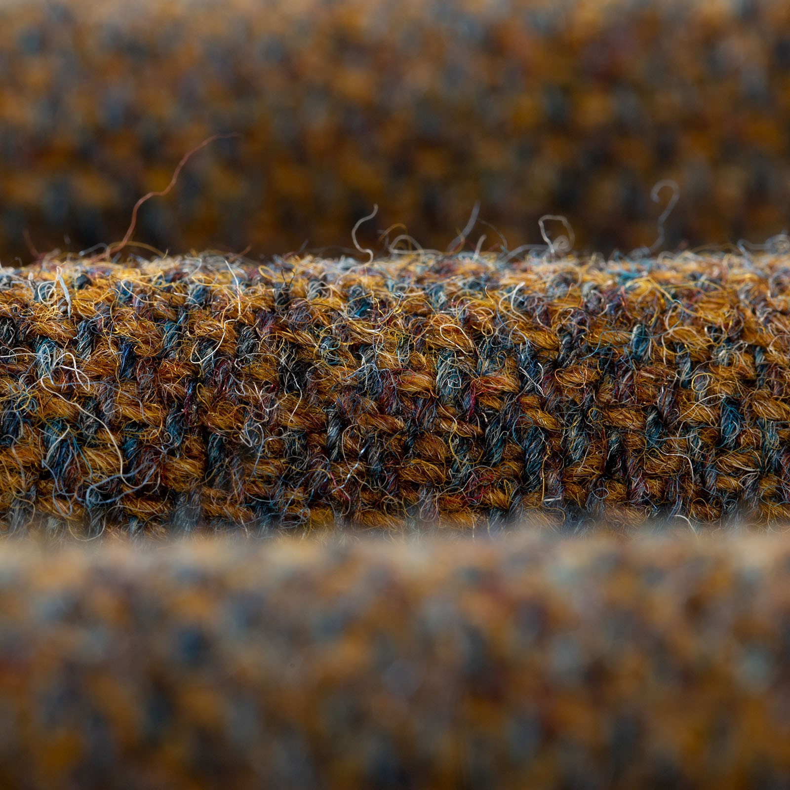 UNIVERSAL WORKS x FLÂNEURS Harris Tweed Plaid Cabin Jacket Gold closeup