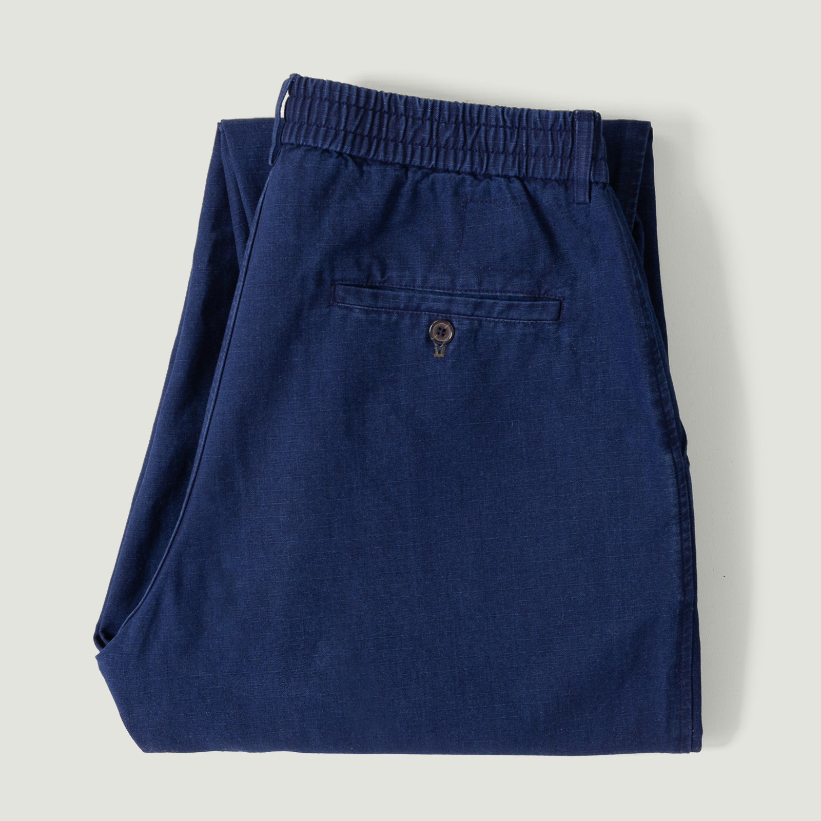 Image-Flâneurs_UNIVERSAL WORKS / Kimstop Pleated Track Pant Indigo_Vignette
