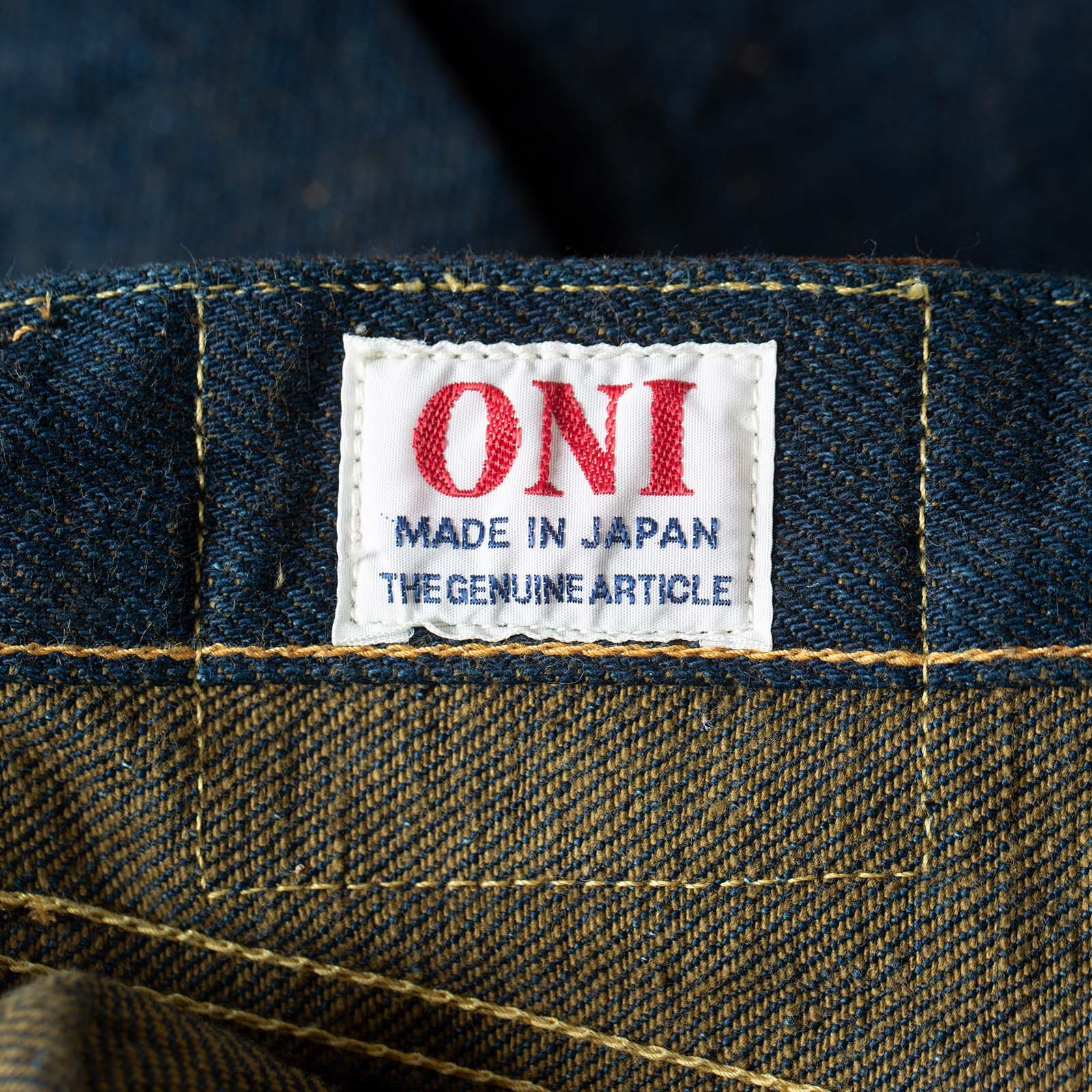 detail flâneurs ONI DENIM 20oz Secret Denim Olive Weft logo