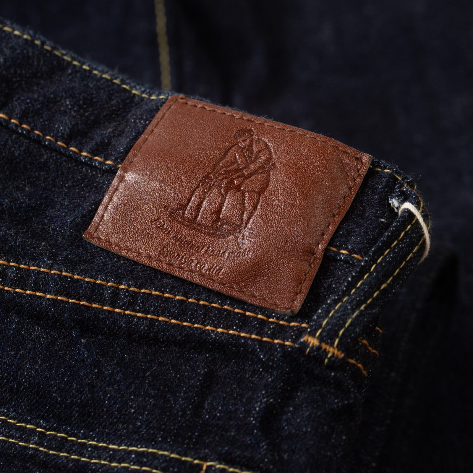 détail leather patch flaneurs Pure Blue Japan XX-002 jeans 14oz Selvedge Denim Piped Straight (2)