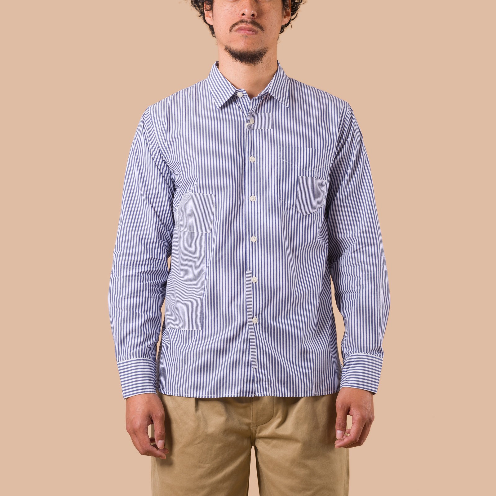 flaneurs UNIVERSAL WORKS Queens Cotton Patched Shirt Navy worn front