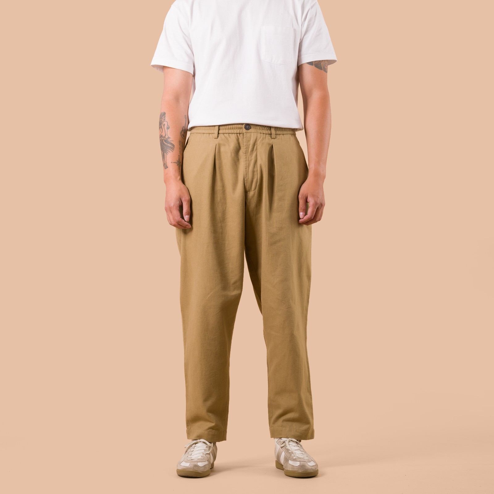 flaneurs worn front UNIVERSAL WORKS Brushed Moleskin Pleated Track Pant Sand