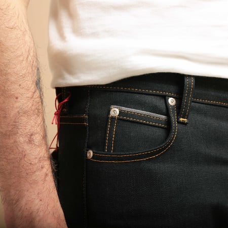 NAKED & FAMOUS SuperGuy Deep Indigo Stretch Selvedge worn in the coin pocket