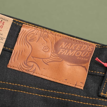 NAKED & FAMOUS SuperGuy Deep Indigo Stretch Selvedge jeans with leather patch