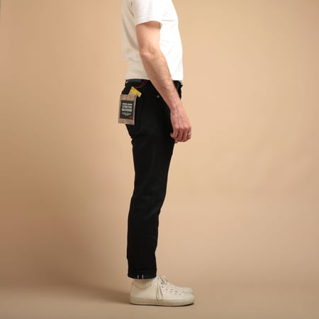 NAKED & FAMOUS SuperGuy Indigo X Indigo Stretch Selvedge jeans worn sideways