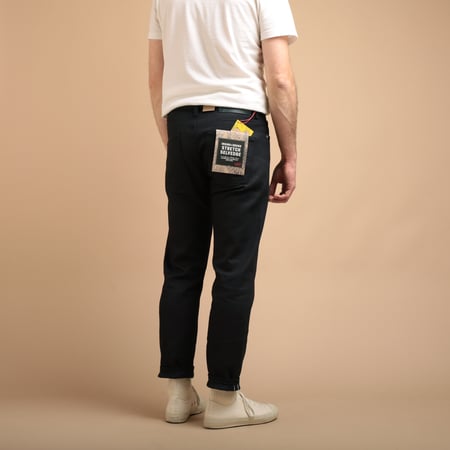 NAKED & FAMOUS SuperGuy Indigo X Indigo Stretch Selvedge jeans worn from the back