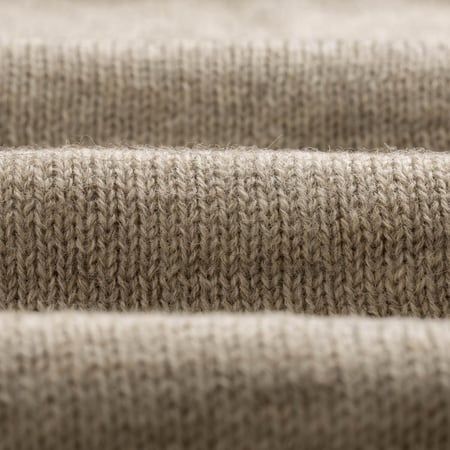 Shetland wool sweater by HARLEY OF SCOTLAND, silver grey color, closeup