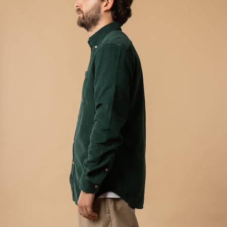 Portuguese Flannel Lobo corduroy shirt in Green, side profile.