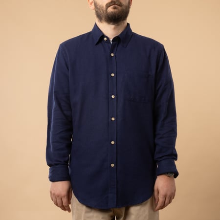 Navy Teca Shirt by PORTUGUESE FLANNEL with front closed.