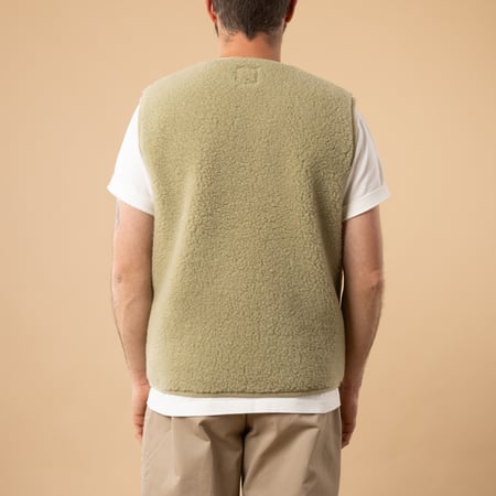 flâneurs-COLDBREAKER-sleeveless wool jacket-Pepitko ultralight pistachio from the back