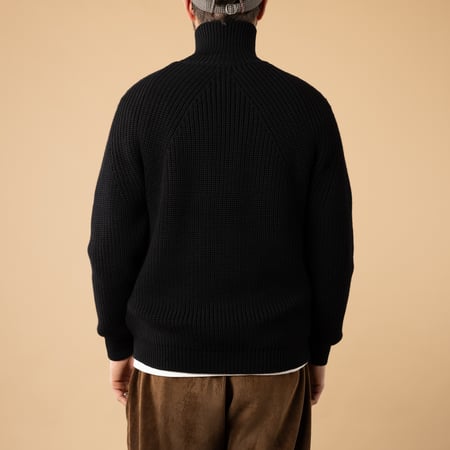 BATONER Signature Turtle Neck Black Sweater - View from the Back