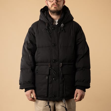FRIZMWORKS Karakoram Down Parka Black worn from the front