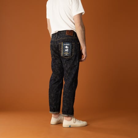 Image of flâneurs wearing ONI DENIM 902-Kasuri 17oz High Rise Relaxed Tapered Denim