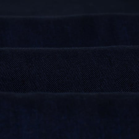 Image of strollers, detail of a noragi by UNIVERSAL WORKS, Kyoto Work Jacket in Indigo Herringbone.