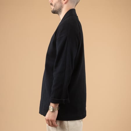 Image of flâneurs wearing a side-carried JAPAN BLUE JEANS Indigo Sashiko Haori-2 jacket.