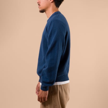 NITTO KNITWEAR X FLANEURS Pull Bedros Geelongora tyne de profil