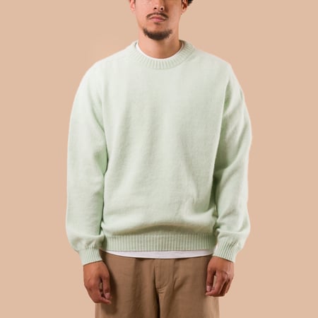 NITTO KNITWEAR X FLANEURS Pull Bedros Geelongora seamistde face
