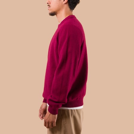 NITTO KNITWEAR X FLANEURS Pull Bedros Geelongora hibiscus de profil