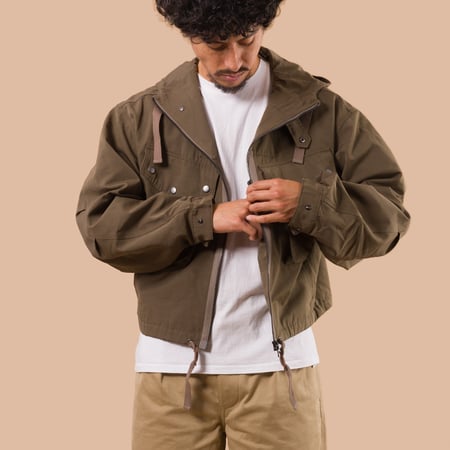 flaneurs Frizmworks Smock Hooded Parka Olive worn without lining