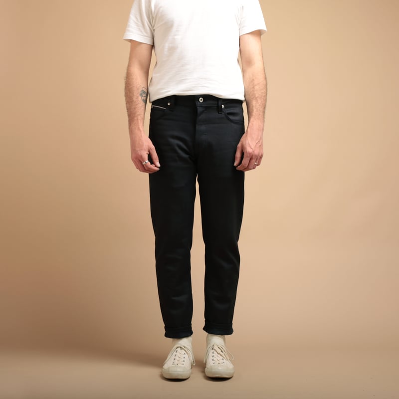 NAKED & FAMOUS SuperGuy Indigo X Indigo Stretch Selvedge jeans worn from the front