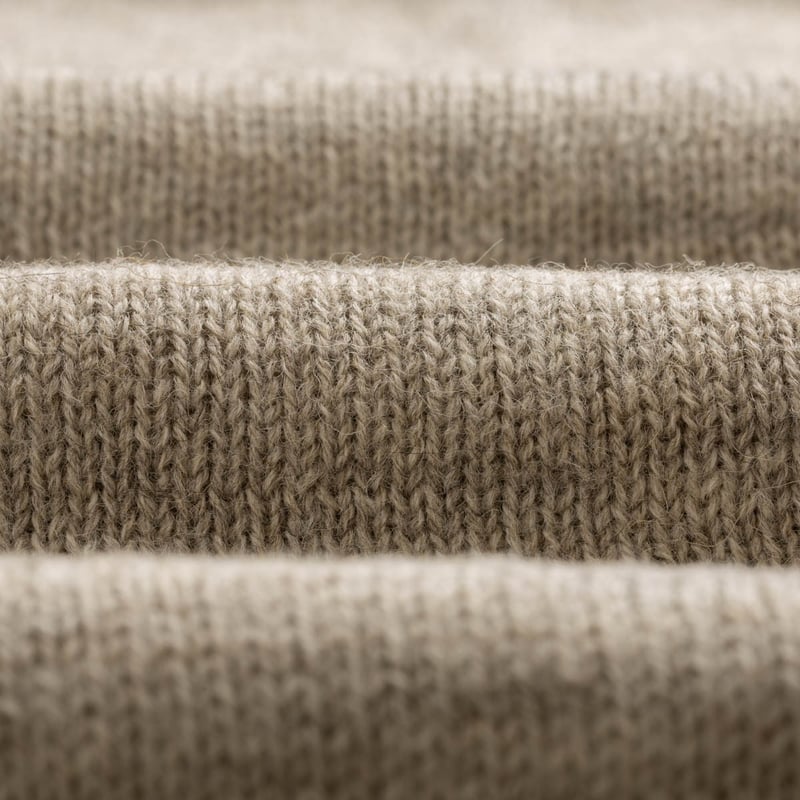 Shetland wool sweater by HARLEY OF SCOTLAND, silver grey color, closeup