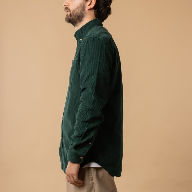 Portuguese Flannel Lobo corduroy shirt in Green, side profile.