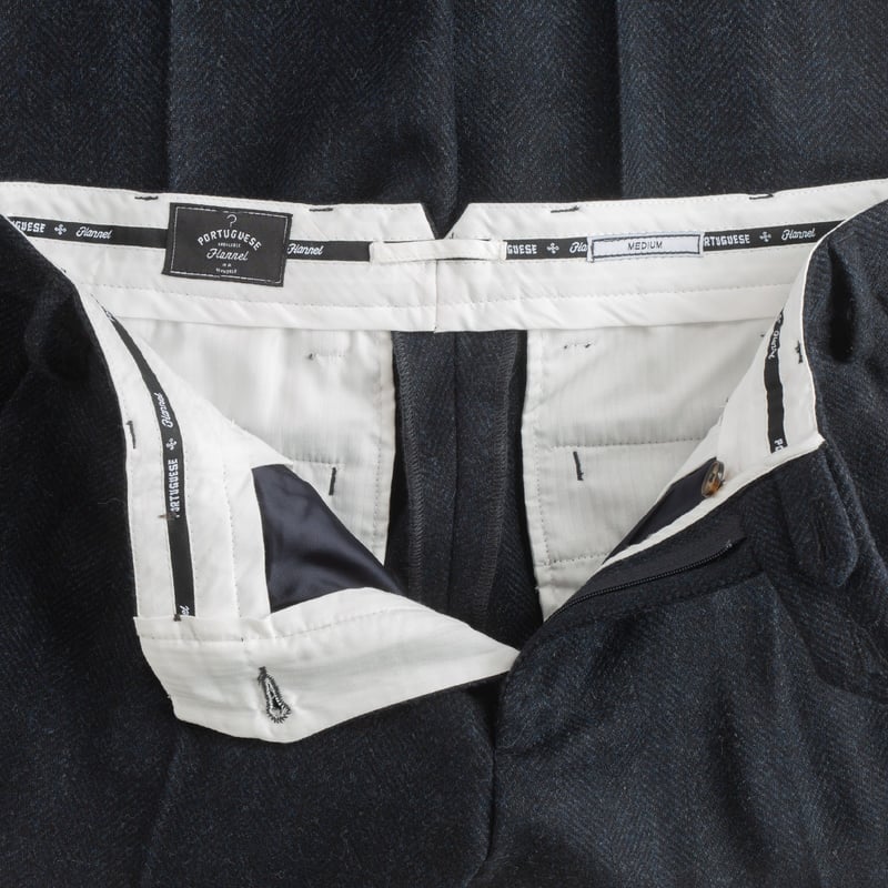 belt-PORTUGUESE FLANNEL-flaneurs-chevron-patterned navy wool trousers