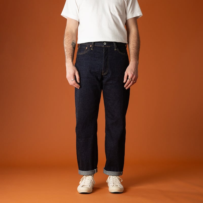 Selvedge jeans worn by urban wanderers, photographed frontally by DUBBLEWORKS.