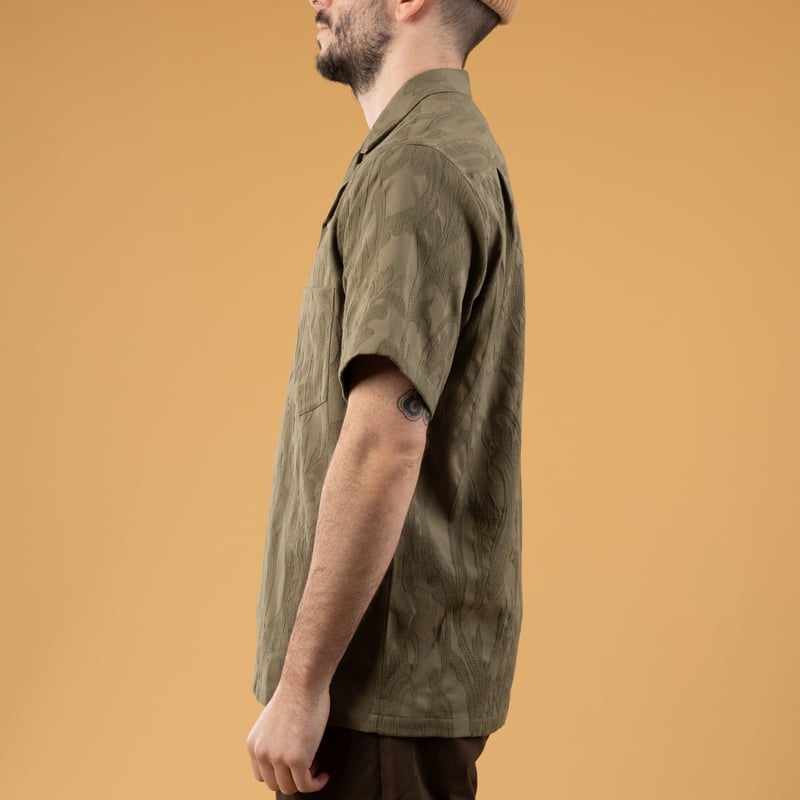 Image of flâneurs wearing PORTUGUESE FLANNEL Summer Paisley Short Sleeve in Olive (2)