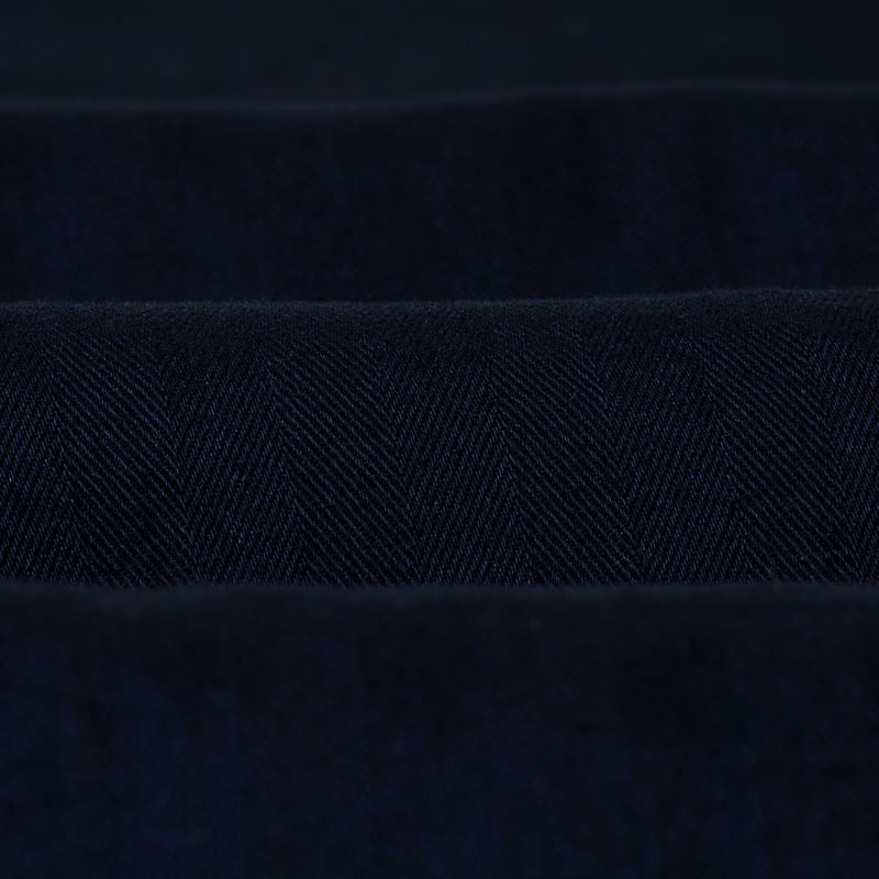 Image of strollers, detail of a noragi by UNIVERSAL WORKS, Kyoto Work Jacket in Indigo Herringbone.
