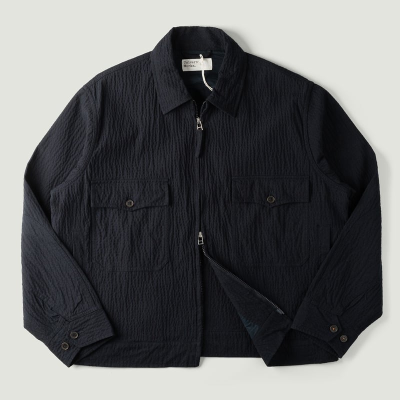 Vignette_Image_Flaneurs_veste courte UNIVERSAL WORKS E130 Jacket Ospina Cotton Dark Navy