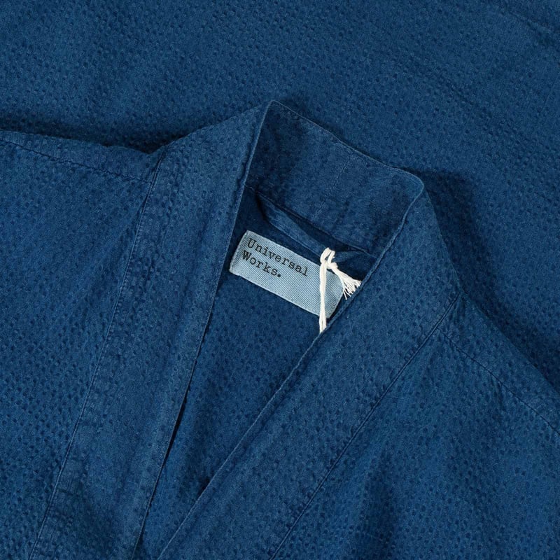 UNIVERSAL WORKS Kyoto Shirt in Washed Indigo Seersucker with spread collar.