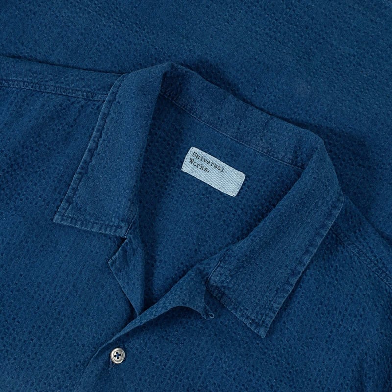 UNIVERSAL WORKS Road Shirt in Washed Indigo Seersucker with Laydown Collar