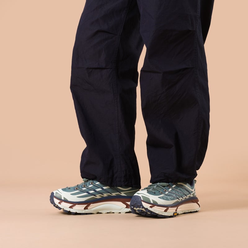 image flâneurs HOKA / Mafate Three 2 Wordmark Fern/Varsity Navy porté 1