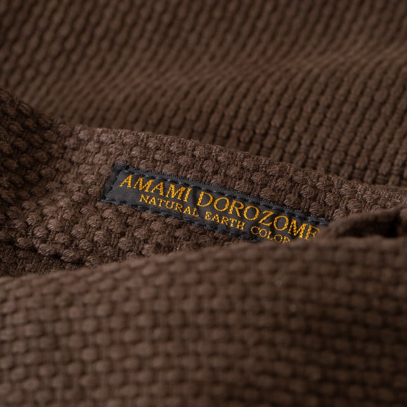 detail tag flaneurs STUDIO D'ARTISAN 1914 17oz Amami Oshima Mud-Dyed Sashiko Dark Brown