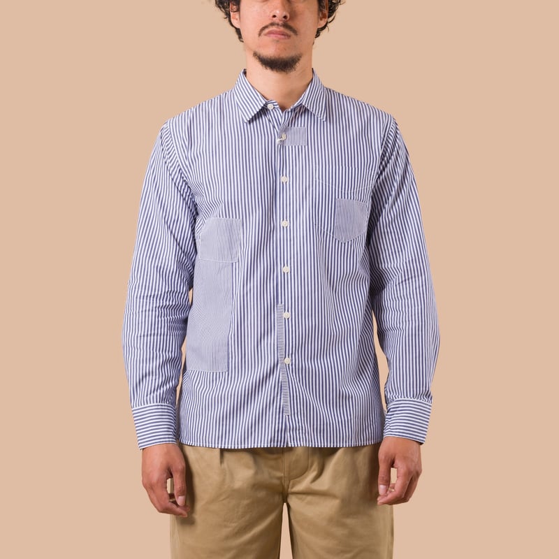 flaneurs UNIVERSAL WORKS Queens Cotton Patched Shirt Navy worn front